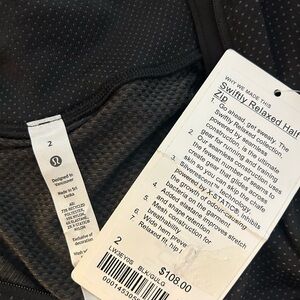 Lululemon Swiftly Polka Dot Relaxed Half Zip in Black